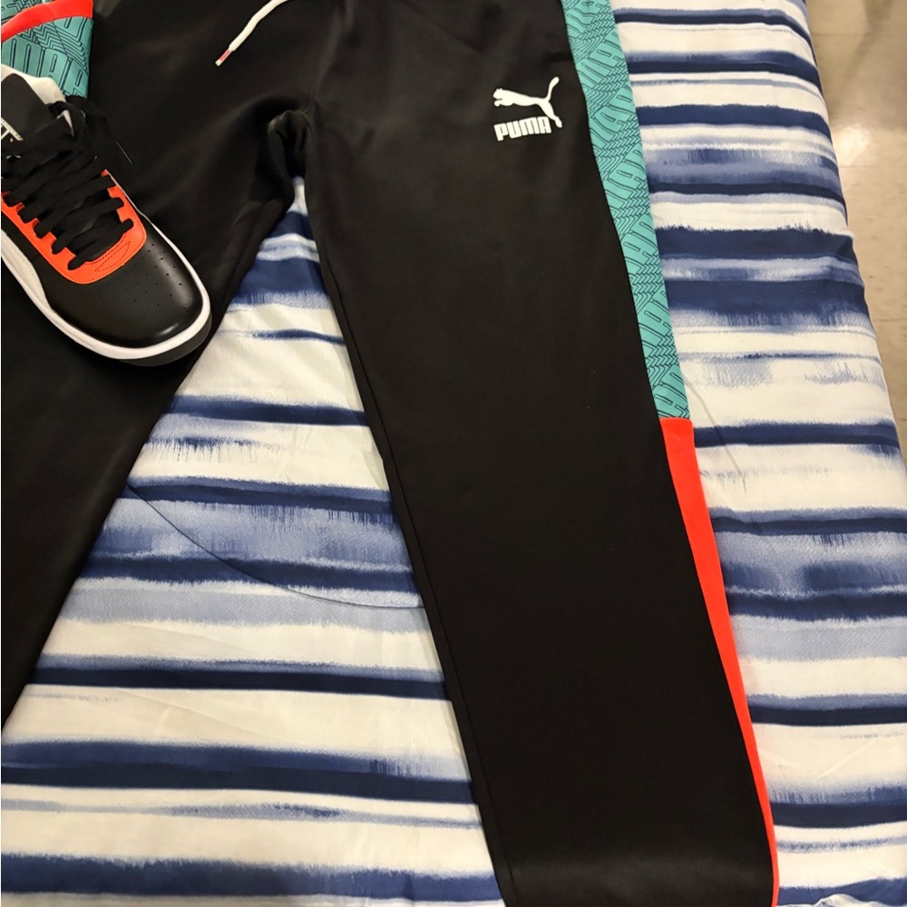Puma Black Pants with Orange and Teal Highlights